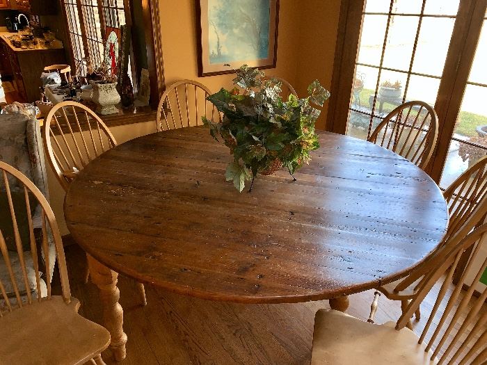  Fantastic extra large round kitchen table. Fits eight chairs. Comes apart for easy removal. 