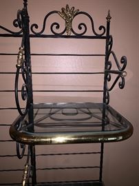 Stunning vintage wrought iron bakers rack with brass trim and glass shelves .   made in Paris France 