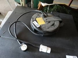 Extension cord reel.