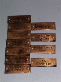 Copper label plates include Jail Supply Fan, Prison Elevator
