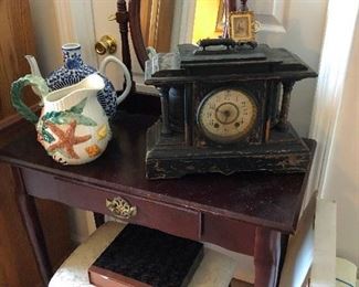 I LOVE this vanity. It has a stool. Old clock and pitchers