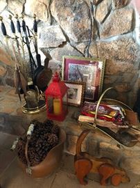 pine cones, hurricane candle, petrified beagle, fieplace implements and/or murder weapons