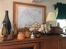 Ships in a bottle minus the bottle! Artisanal pottery!