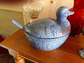 What is sticking out of that duck's butt?