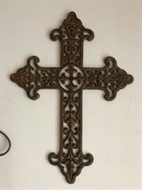 cross for warding off demons conjured by the ouiga board from earlier