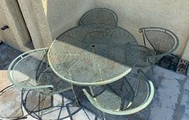 Vintage Wrought Iron Mesh Patio Table w/ 4 Chairs	29 x 42in diameter	
