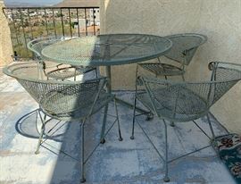 Vintage Wrought Iron Mesh Patio Table w/ 4 Chairs	29 x 42in diameter	