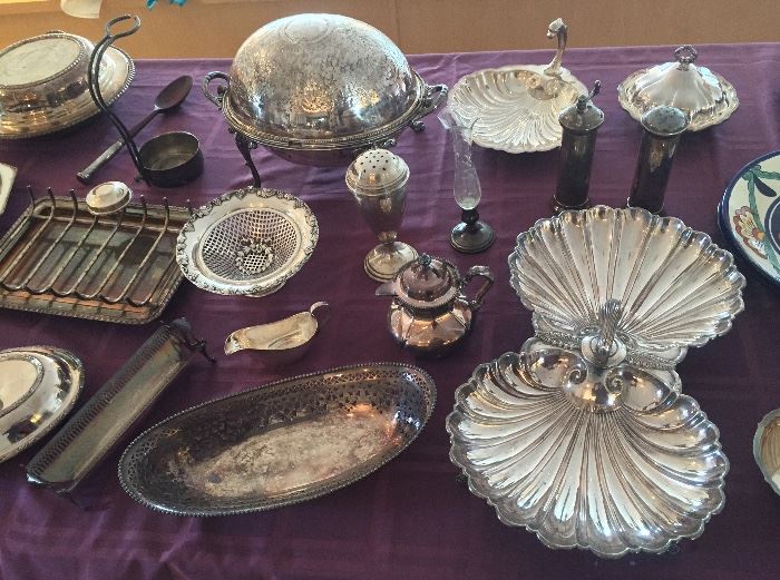 Silver plate hollowware: double shell server, pierced oval bowl, cracker holder, Sheffield pierced footed bowl with grapes, Sheffield sugar shaker & more