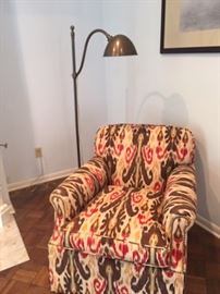 Two upholstered club chairs with two Ralph Lauren lamps.