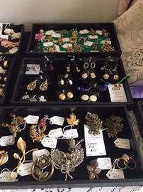 Costume jewelry (some signed) that could fill a store, and a few pieces of fine jewelry fine jewelry.