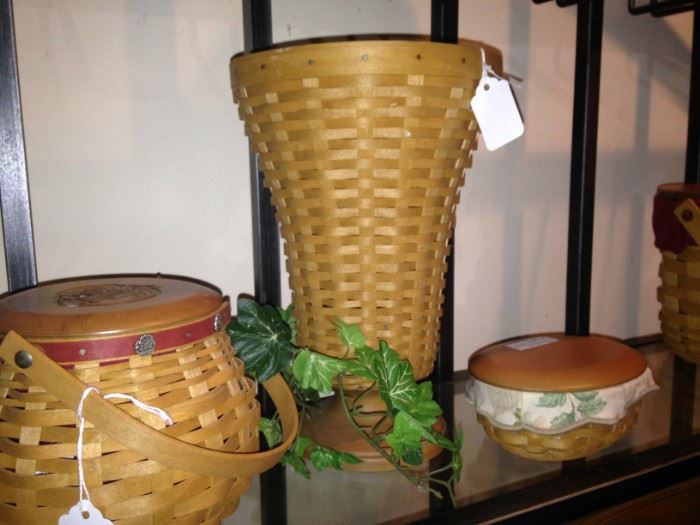 Assorted shapes and sizes of Longaberger baskets