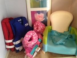 Child's life vests; booster seat