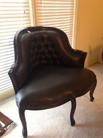 Black chair with tufted back