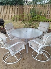 Table & 4 swivel chairs