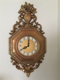 Syroco wall clock, battery operated. More Syroco throughout the home.