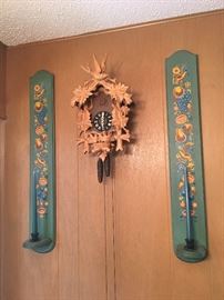 Antique West German Schmenkenbecker cuckoo clock with wall mounted candeleabras