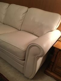 detail: white leather sofa