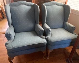 Pair of wingback chairs with Queen Anne legs