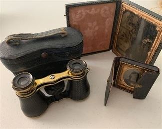 Antique opera glasses in case and daguerreotypes
