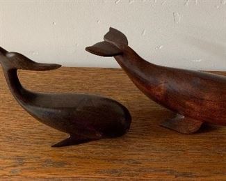 Carved wood whales