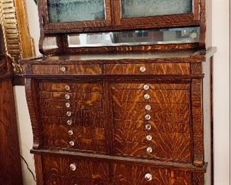 Antique tiger/quartersawn oak dental/medical cabinet with acid etched glass doors