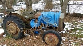 1948 Ford tractor, model 9N, (last used 10 years ago) with&nbsp;bush hog, single blade furrow plow, front snow blade, trailer and snow tire chains