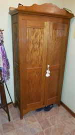 antique armoire/quilt storage cabinet