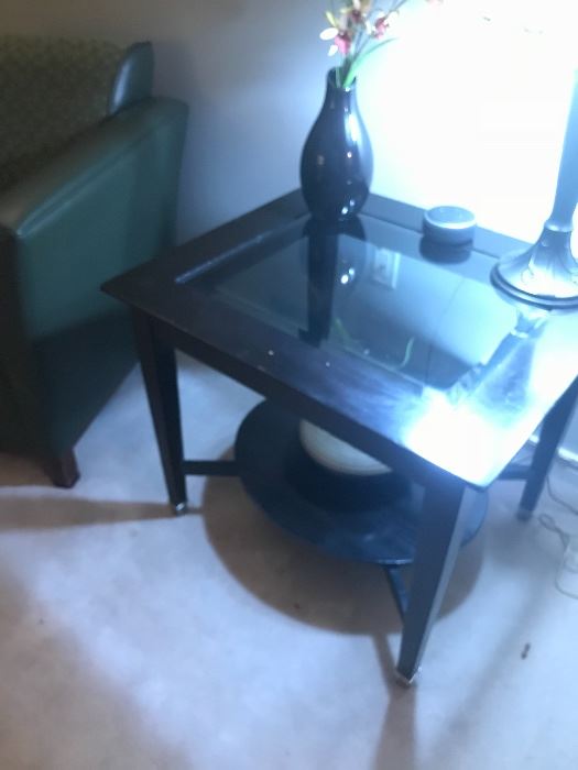 Wood with glass end table which also has additional matching pieces available!