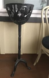 old cast iron plant stand