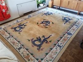 Vintage 1960's/1970's, hand-woven Chinese dragon, Art Deco style area rug. You must feel how soft and luxurious this rug is! Woven with four clawed dragon design in blue with other soft earth tones. Size of rug is 12' ft X 9' ft.  (See lot 27 for other Chinese area rug).
***REMOVAL DAY FOR THIS ITEM IS THURSDAY, MARCH 14th FROM 10:00 A.M to 2:00 P.M ONLY. PLEASE BE SURE TO READ INFORMATION LOT "0" FOR SPECIAL REMOVAL INSTRUCTIONS ON THIS ITEM***