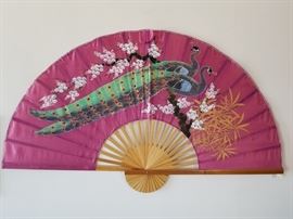 Large authentic decorative hand painted Japanese silk fan. Approximate dimensions are 36" H X 60" W at its full extension.