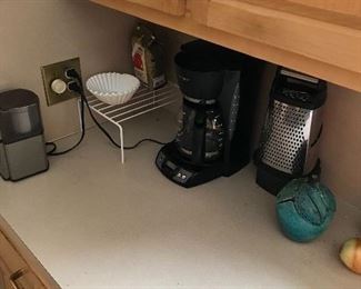 Coffee maker coffee bean grinder and cheese grater