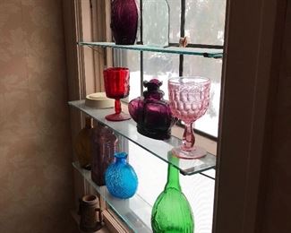 Variety of colored glass bottles