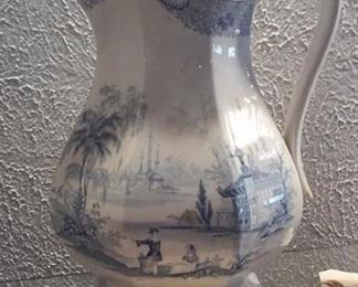 Large old antique blue willow ware pitcher