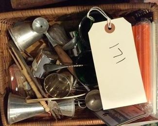 miscellaneous vintage barware in a neat basket