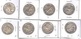 FOUR walking liberty half dollars