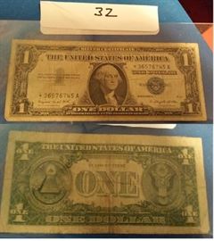 There are several old silver certificates in this auction