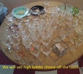 This is just one of 4 tables loaded with glass we will sell at this auction. 