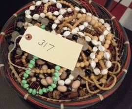 basket full of jewelry.  all necklaces I think. 