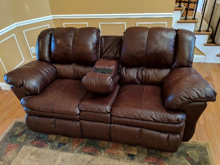 Leather reclining loveseat 