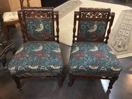A Pair of Early 20th Century Vintage Hand Carved Wooden Upholstered Side Chairs on casters, Dimensions
    10.5ʺW × 21ʺD × 34ʺH