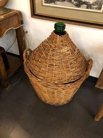 Large Demijohn green bottle covered with wicker bottom and top