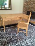 Desk and animal print rug