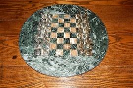 UNIQUE CHESS SET WITH METAL MINI PIECES ON A MARBLE BASE.