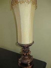 TORCHIER TABLE LAMP WITH LONGATED SHADE
WITH BEADING
