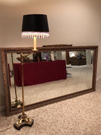 LARGE MIRROR IN ORNATE FRAME
 APPROXIMATELY 42"  x   42"
BRASS SWING ARM FLOOR LAMP
