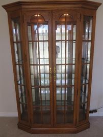 LIGHTED CURIO CABINET MIRRORED BACK
GLASS SHELVES