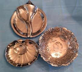 No stains on the bottoms of serving pieces.  Don't know what made them show in the pictures.  