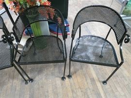 Pair of Salterini club chairs in jet black