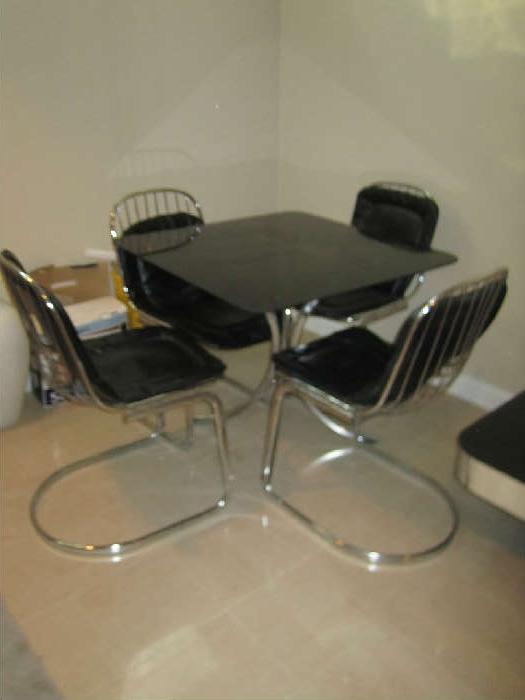 GLASS TABLE WITH FOUR CHAIRS
